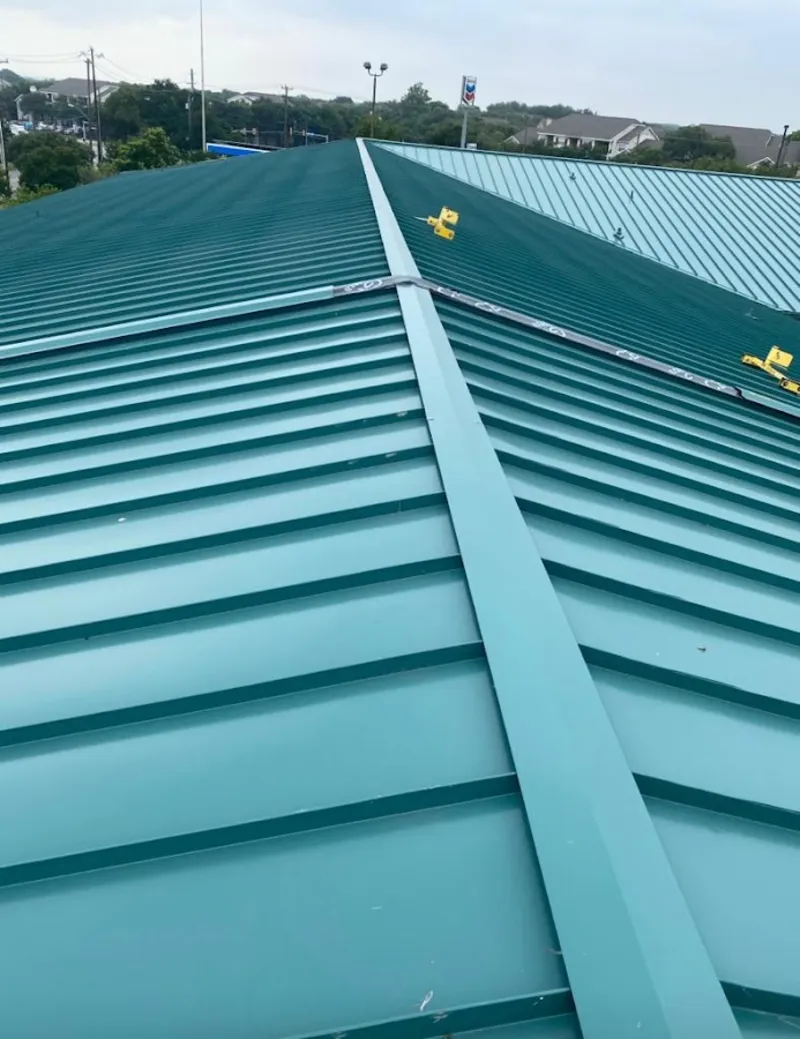 Green commercial metal roof ridge and valley for Metal Roof Repair in Ralston