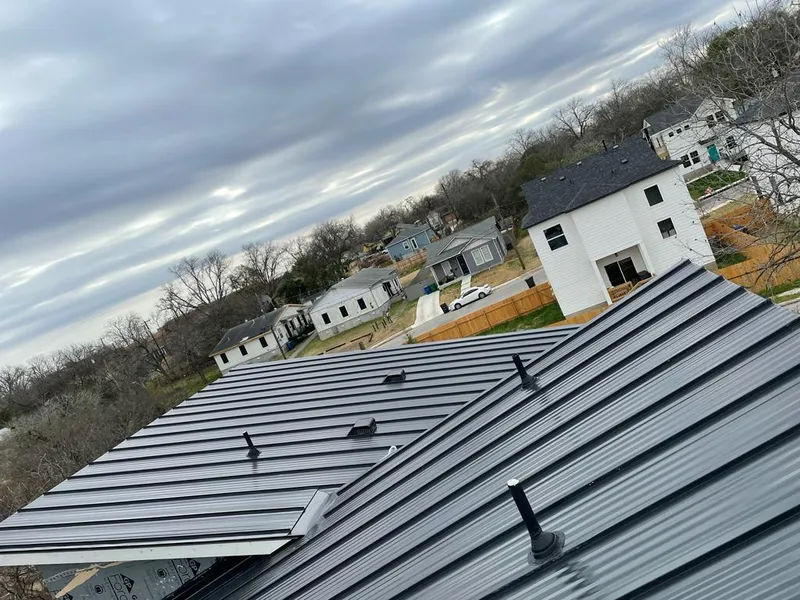 Standing seam metal roof panels with vents for Skylight Repair in Ralston